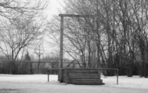 PRESENT AT A HANGING by Ambrose Bierce